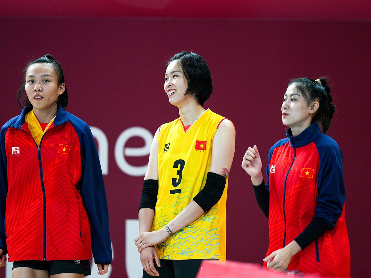 Đội tuyển nữ bóng chuyền Việt Nam giành chiến thắng ấn tượng trước Nepal tại ASIAD 19 - 548055398